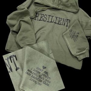 Crop hoodie womenβs size medium βResilientβ in black letters new/never worn